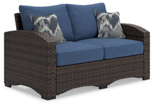 Load image into Gallery viewer, Windglow - Blue / Brown - Loveseat With Cushion