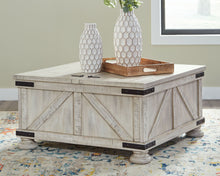 Load image into Gallery viewer, Carynhurst - Whitewash - Cocktail Table with Storage